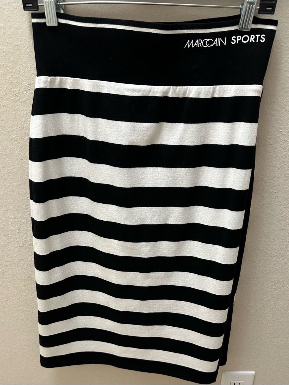 This is a black-and-white striped knit pencil skirt by Marc Cain Sports.
